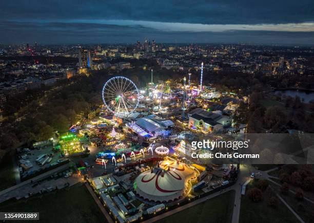 An aerial view of the Winter Wonderland in Hyde Park at dusk on November 16,2021 in London, United Kingdom.