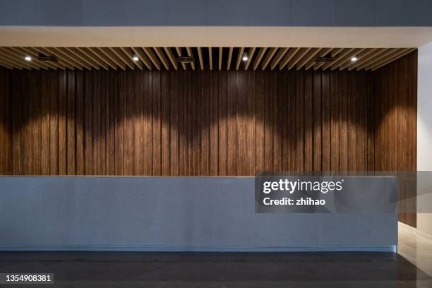 lobby desk - bar wall stock pictures, royalty-free photos & images