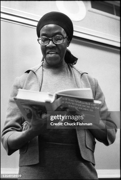 View of American Pulitzer Prize-winning poet Gwendolyn Brooks as she reads from her anthology 'The World of Gwendolyn Brooks' during an event at on...