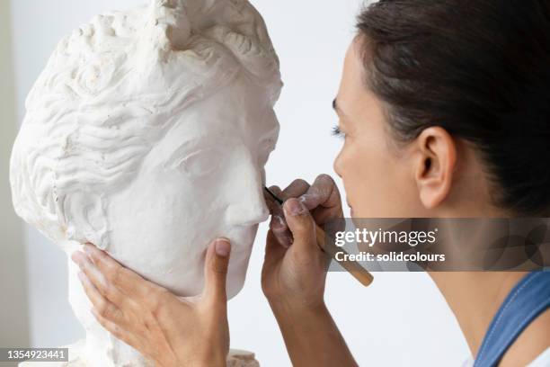 female sculptor - sculptor stock pictures, royalty-free photos & images
