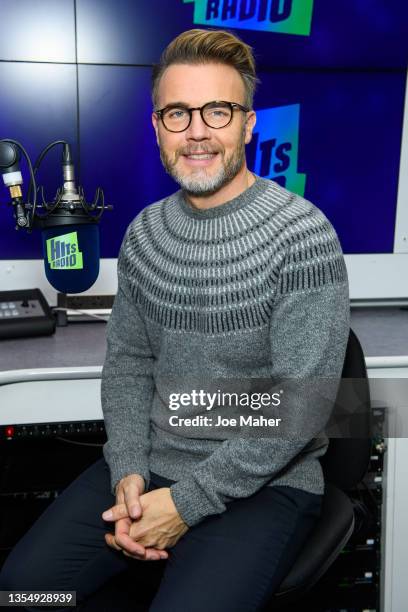 Gary Barlow visits Hits Radio on November 22, 2021 in London, England.