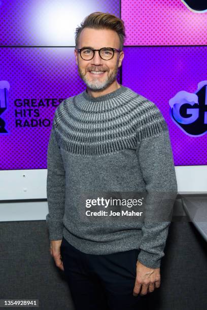 Gary Barlow visits Greatest Hits Radio on November 22, 2021 in London, England.