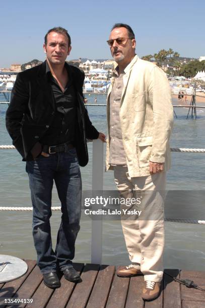 Jean Dujardin and Jean Reno during 2007 Cannes Film Festival - "Cash" Photocall at Palais des Festival in Cannes, France.