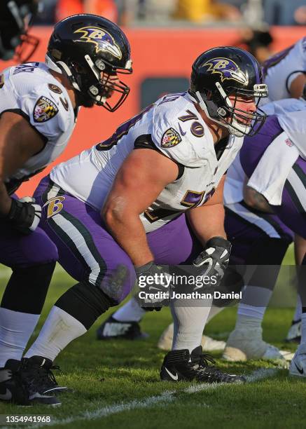 Kevin Zeitler of the Baltimore Ravens awaits the snap against the Chicago Bears at Soldier Field on November 21, 2021 in Chicago, Illinois. The...