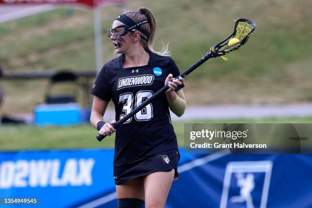 Erin McGuire of the Lindenwood Lions handles the ball against the Queens Royals during the Division II Women’s Lacrosse Championship held at Kerr...