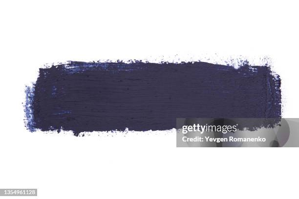 dark blue brush stroke isolated on white background - brush paint stock-fotos und bilder