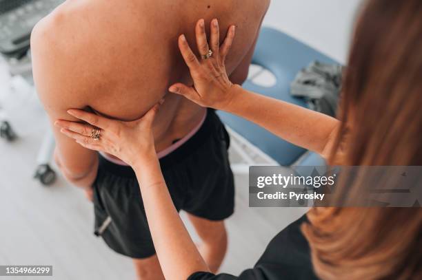 manual muscles tests and posture checking - posture stock pictures, royalty-free photos & images