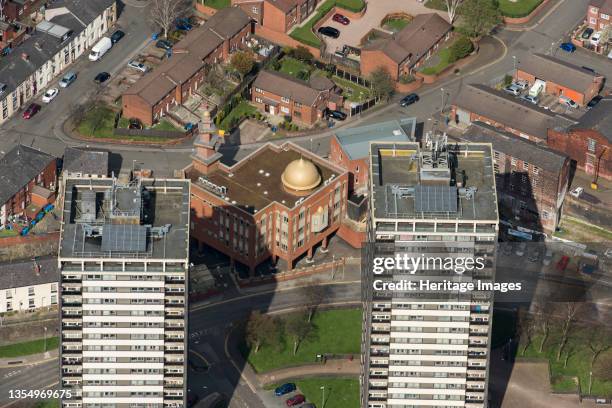 Golden Mosque overshadowed by two of the Seven Sisters towers, Rochdale, 2019. Artist Historic England.