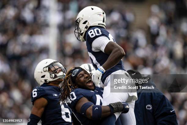 Malick Meiga of the Penn State Nittany Lions celebrates with Jesse Luketa after scoring a touchdown against the Rutgers Scarlet Knights during the...