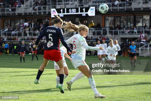 Kelley O'Hara of Washington Spirit scores the go-ahead goal over Makenzy Doniak of Chicago Red Stars during the NWSL Championship held at Lynn Family...