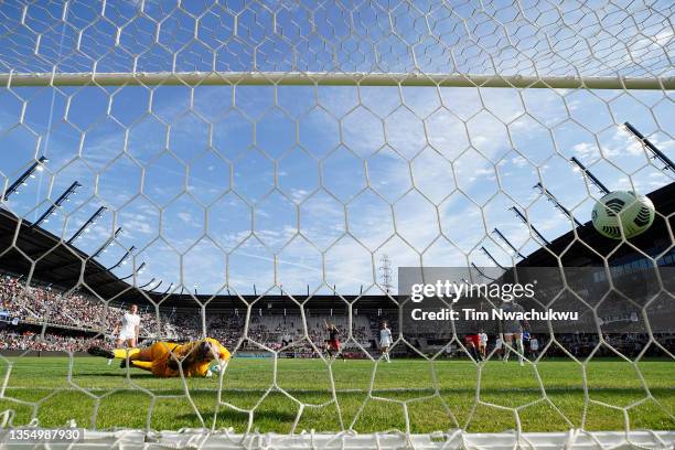 Kelley O'Hara of Washington Spirit scores during extra time against Chicago Red Stars during the NWSL Championship held at Lynn Family Stadium on...