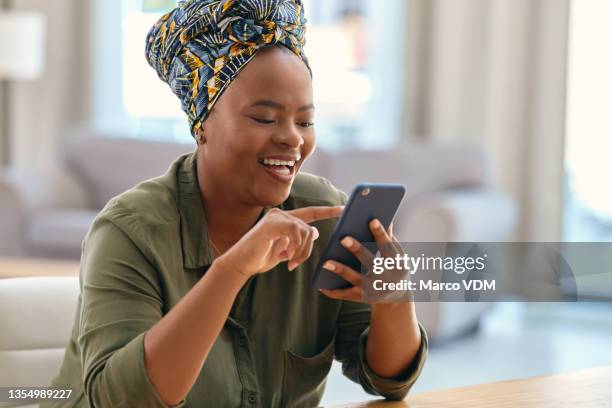 shot of a young businesswoman using her smartphone to send a text message - turban stock pictures, royalty-free photos & images