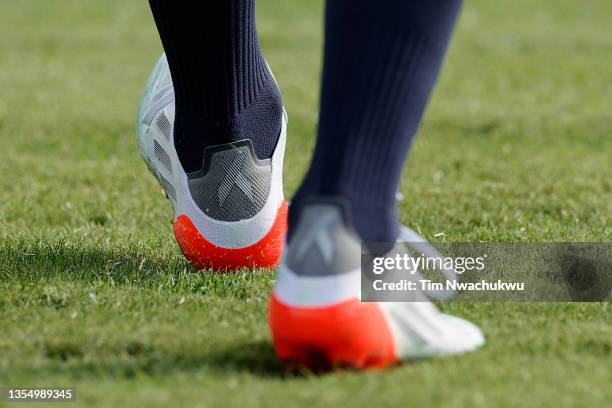 The cleats of Trinity Rodman of Washington Spirit are seen against Chicago Red Stars during the NWSL Championship held at Lynn Family Stadium on...