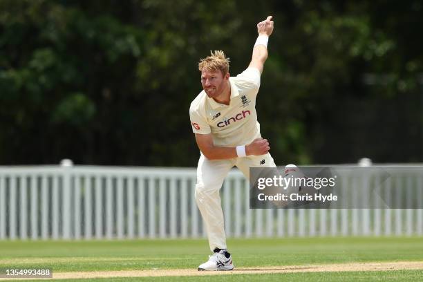 Liam Norwell of England Lions bowls during day one of the Tour Match between England and the England Lions at Redlands Cricket Inc on November 23,...