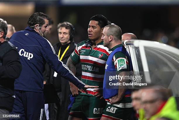 George Chuter and Manu Tuilagi talk to an ERC official after being sin binned during the Heineken Cup match between ASM Clermont Auvergne and...