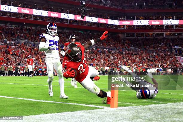 Ronald Jones of the Tampa Bay Buccaneers dives into the endzone for a touchdown in the second quarter of the game against the New York Giants at...