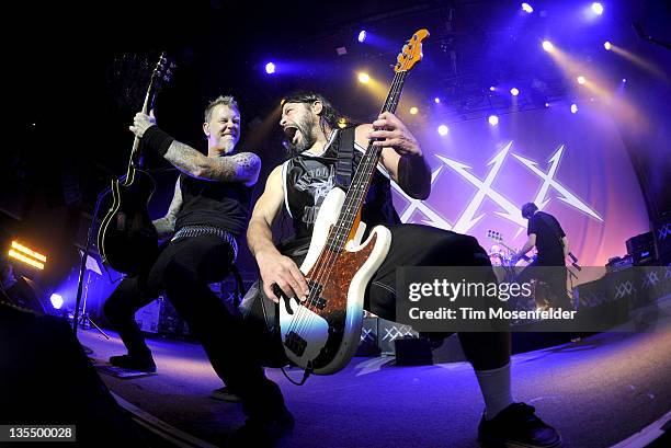 James Hetfield, Robert Trujillo, and Jason Newsted of Metallica perform at Day Four of the bands' 30th Anniversary shows at The Fillmore on December...