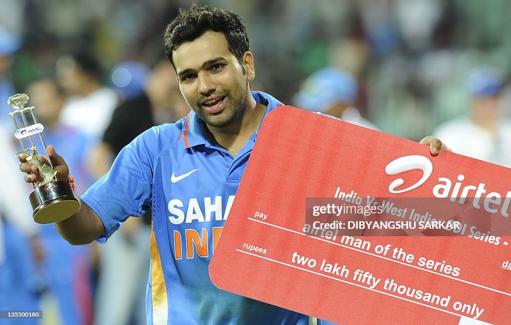 Indian cricketer Rohit Sharma pose with