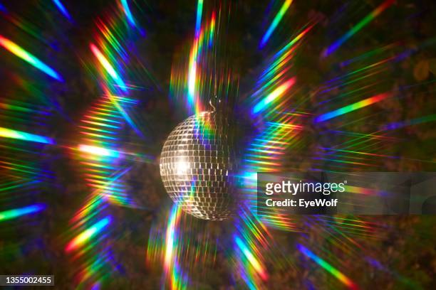 psychedelic disco ball with colorful reflections. - disco fotografías e imágenes de stock