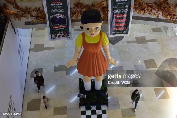 Replica animated doll from the Netflix series 'Squid Game' is on display at a shopping mall on November 22, 2021 in Chongqing, China.