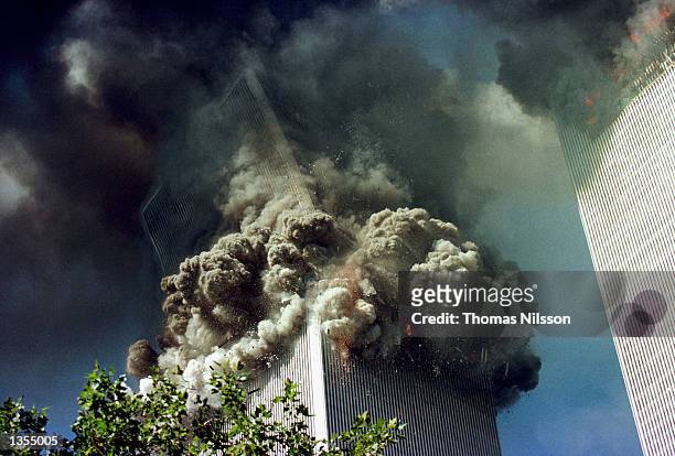 The south tower of the World Trade Center collapses September 11, 2001 in New York City.