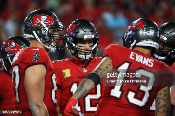 Tom Brady of the Tampa Bay Buccaneers in the huddle with teammates during the second half against the New York Giants at Raymond James Stadium on...