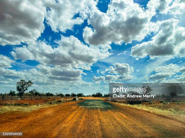 outback australia road trip, driving on country highway and clouds - driving car australia road copy space sunlight travel destinations colour image day getting stock pictures, royalty-free photos & images
