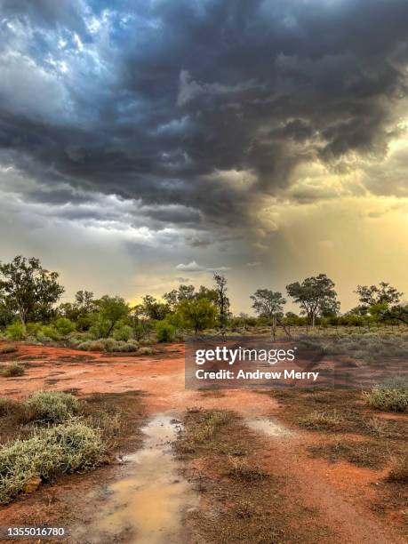 dirt road, storm rain clouds, rural farm australia - bush land stock pictures, royalty-free photos & images