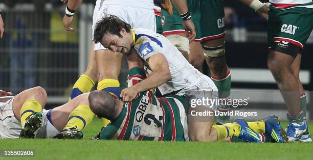 George Chuter, the Leicester hooker tustles with Morgan Parra, which led to Chuter being shown the yellow card by referee Alain Rolland during the...