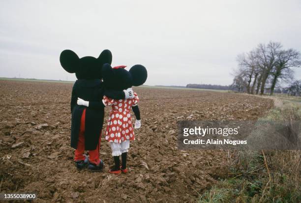 Mickey Mouse and Minnie Mouse visit the site of the future Disneyland in Marne La Vallee.