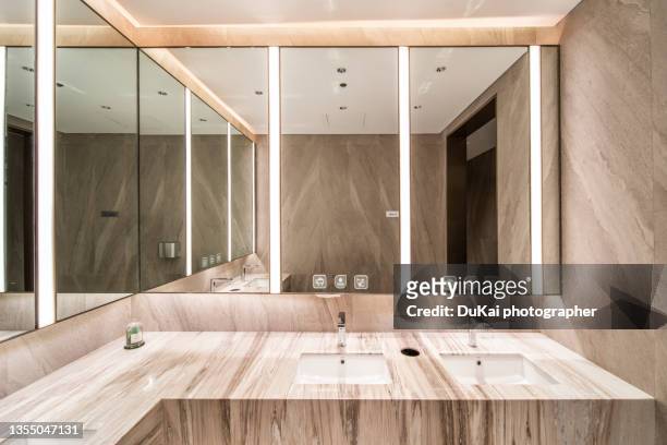 public restroom in shopping center - mirror stock pictures, royalty-free photos & images