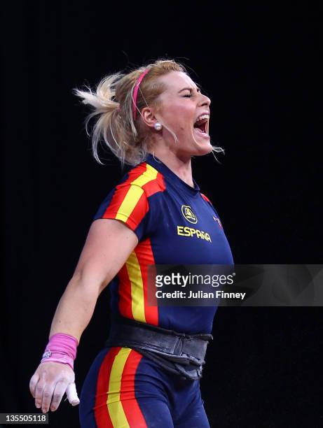 Lidia Valentin of Spain reacts in the Women's 75kg during the Weightlifting LOCOG Test Event for London 2012 at ExCel on December 11, 2011 in London,...
