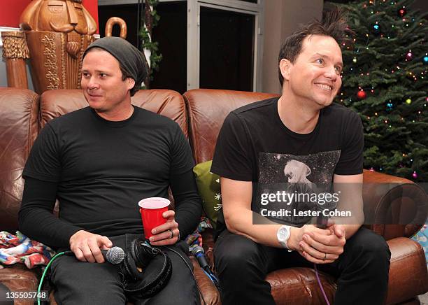 Musicians Tom DeLonge and Mark Hoppus of Blink-182 backstage at the 22nd Annual KROQ Almost Acoustic Christmas Concert held at Gibson Amphitheatre on...