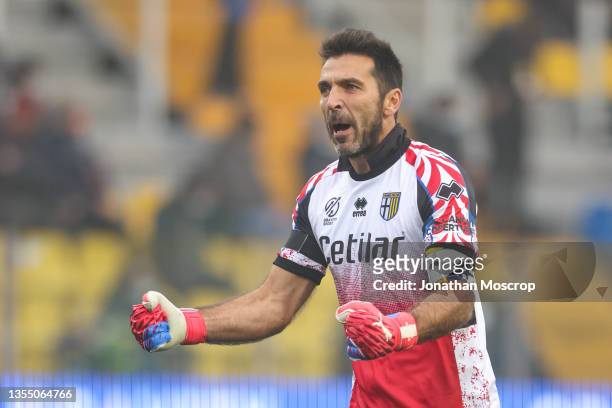 Gianluigi Buffon of Parma Calcio wearing a commemorative jersey similar to that on his Parma debut 26 years ago on the 19th November 1995 celebrates...