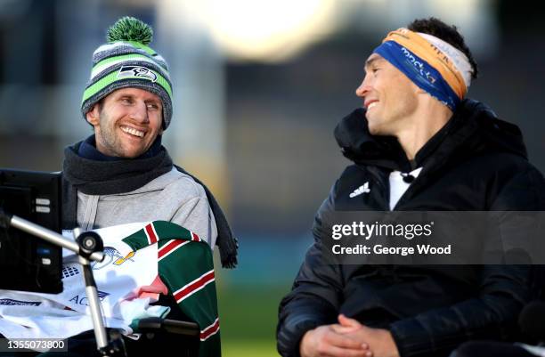 Ex-Leeds Rhinos rugby league player Kevin Sinfield speaks with former teammate Rob Burrow after completing his Extra Mile Challenge at Emerald...