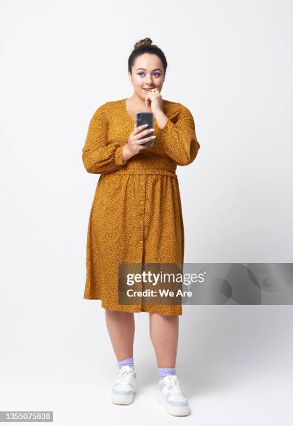 gen z woman with smartphone - gen i stock pictures, royalty-free photos & images