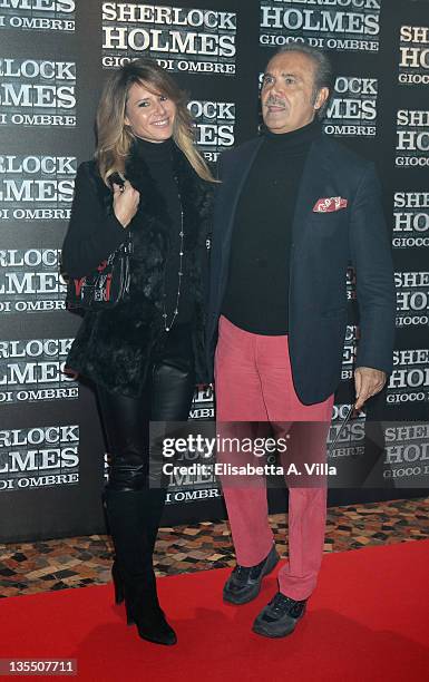 Ingrid Muccitelli and Mauro Masi attend 'Sherlock Holmes: Games Of Shadows' Premiere at The Space Moderno Cinema on December 11, 2011 in Rome, Italy.