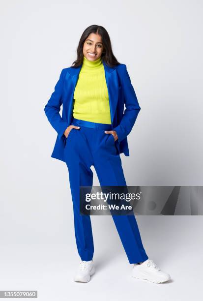 gen z business woman with hands in pockets - business casual outfit stock pictures, royalty-free photos & images