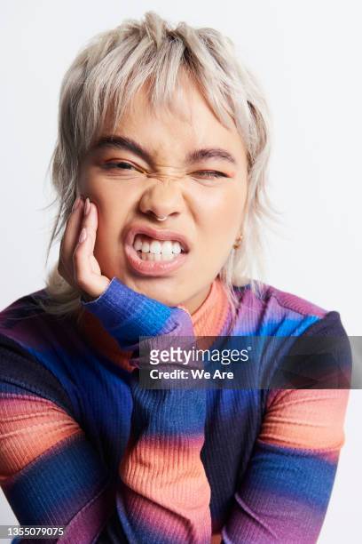 studio portrait of fashionable gen z woman - renegade stock pictures, royalty-free photos & images