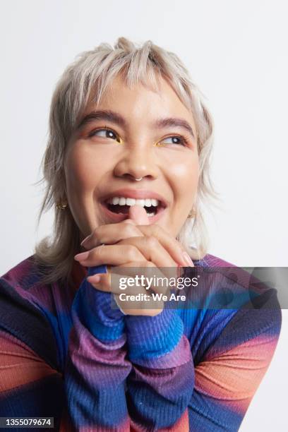 studio portrait of fashionable gen z woman - looking away stock pictures, royalty-free photos & images