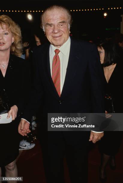 American actor Lionel Stander and his wife Stephanie attend the Westwood premiere of 'Chances Are' held at Mann's Bruin Theatre in Los Angeles,...