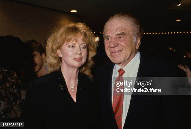 American actor Lionel Stander and his wife Stephanie attend the Westwood premiere of 'Chances Are' held at Mann's Bruin Theatre in Los Angeles,...