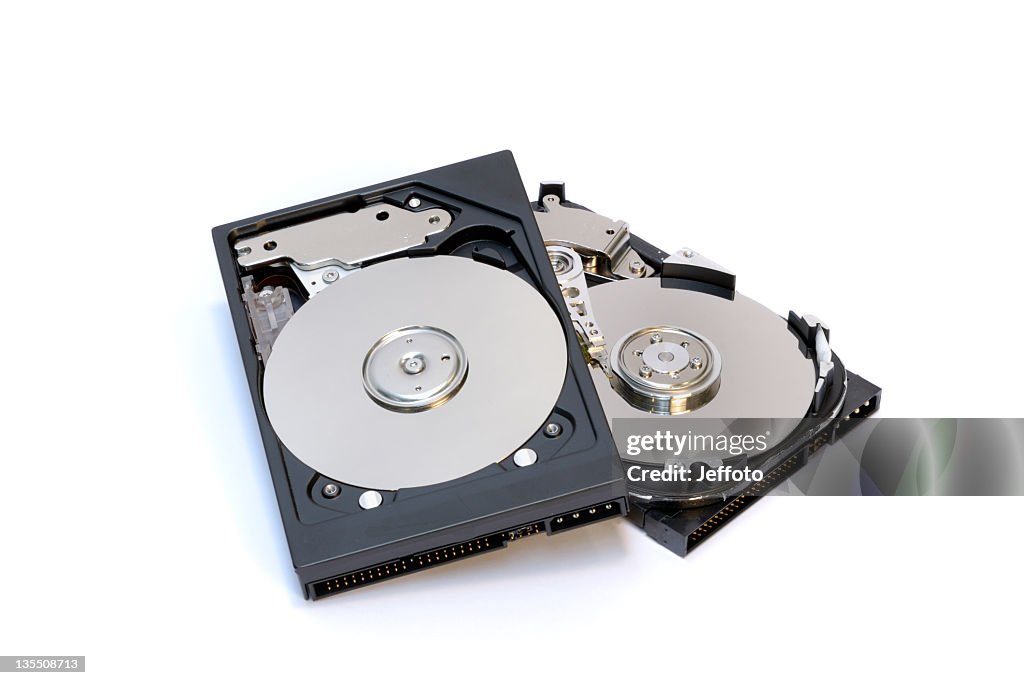 Two computer hard disk drives on white background