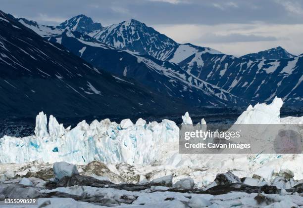 sunlight hits iceflows on lowell lake, alsek river, british columbia, canada - alsek river stock pictures, royalty-free photos & images