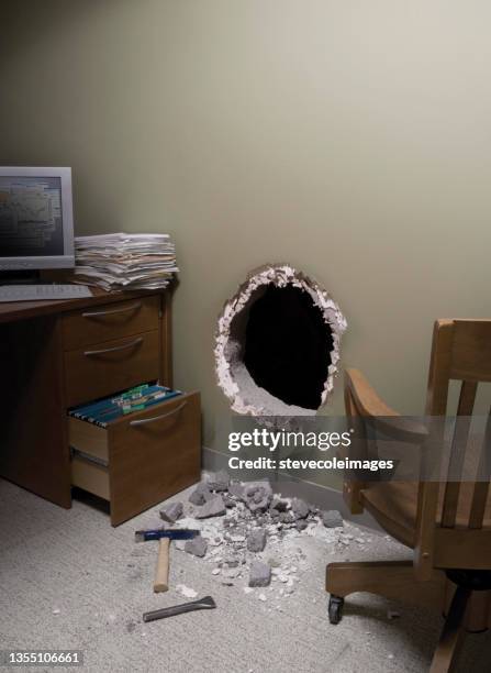 hole in the wall to escape from work. - escaping office stock pictures, royalty-free photos & images