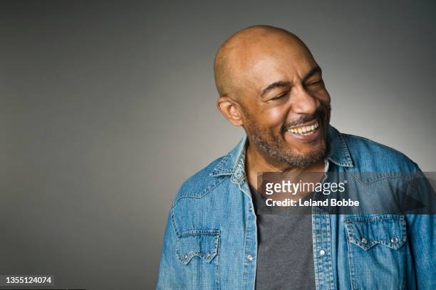 studio portrait of middle aged african american male - western shirt stock pictures, royalty-free photos & images