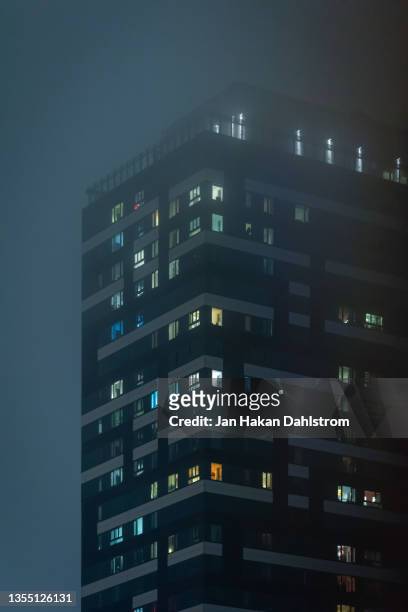 highrise in fog - stockholm building stock pictures, royalty-free photos & images