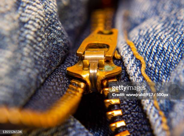 close-up of zipper on jeans - zip foto e immagini stock