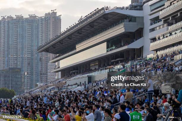 November 21 : Racegoers at Sha Tin Racecourse on November 21, 2021 in Hong Kong.