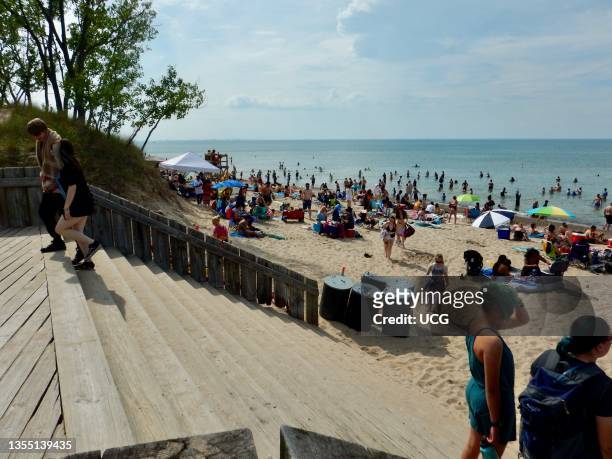 Lake Michigan and tourists at West Beach, Large crowd on sandy West Beach.
